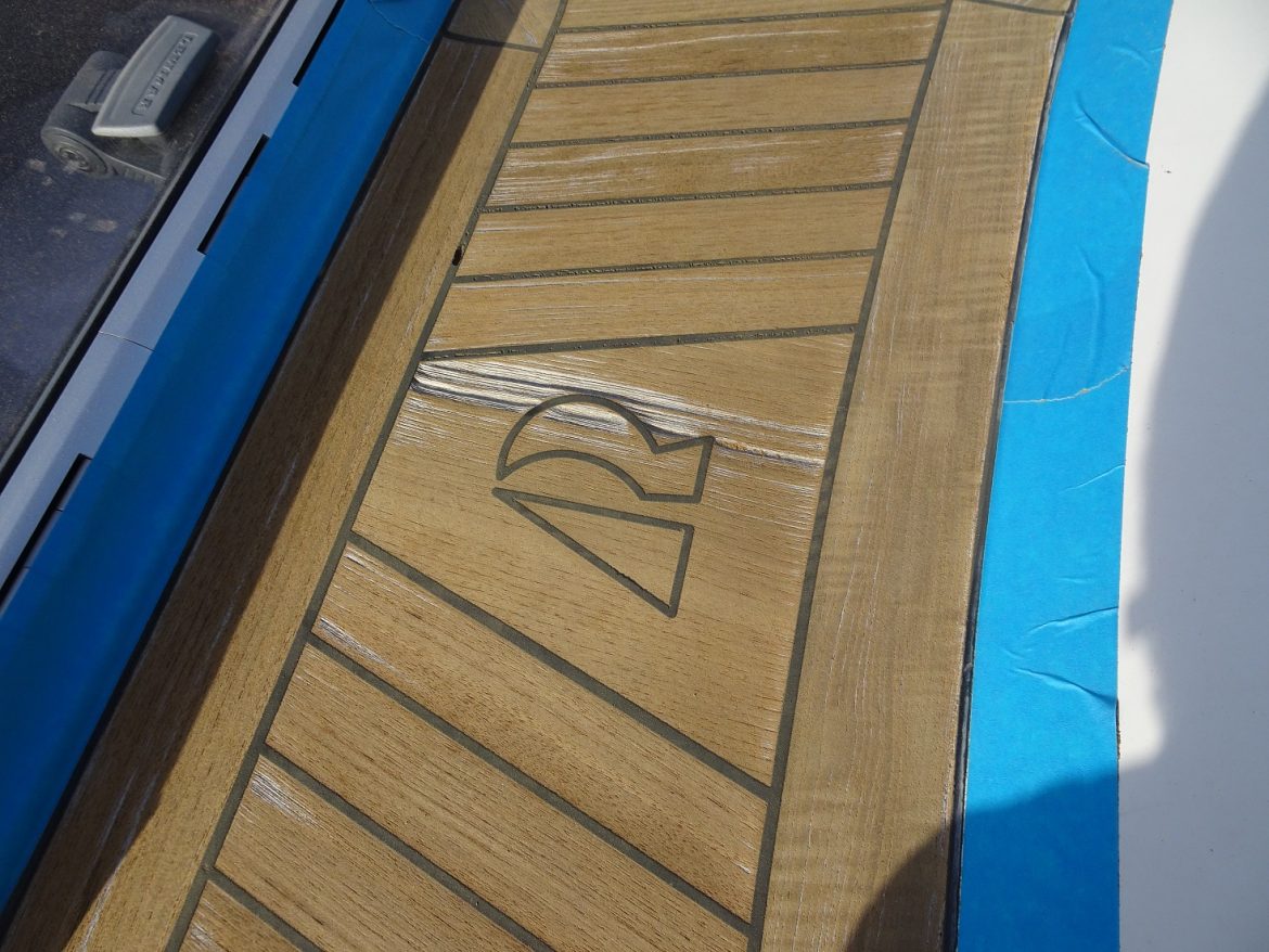 Some deep wear just could not be sanded. Note also the air bubbles in the original sikaflex.