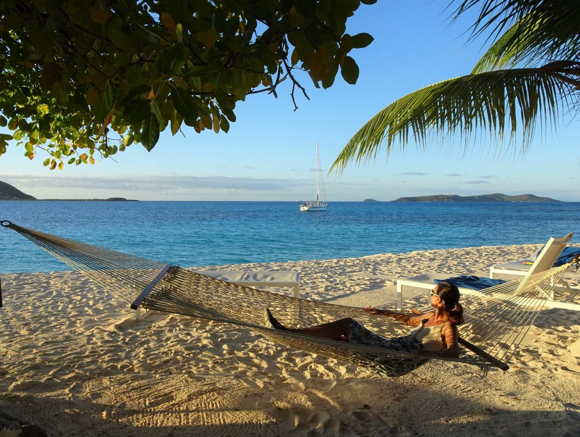 Oana admires Cloudy Bay from a hammock, on Palm Island Oana admires Cloudy Bay from a hammock, on Palm Island