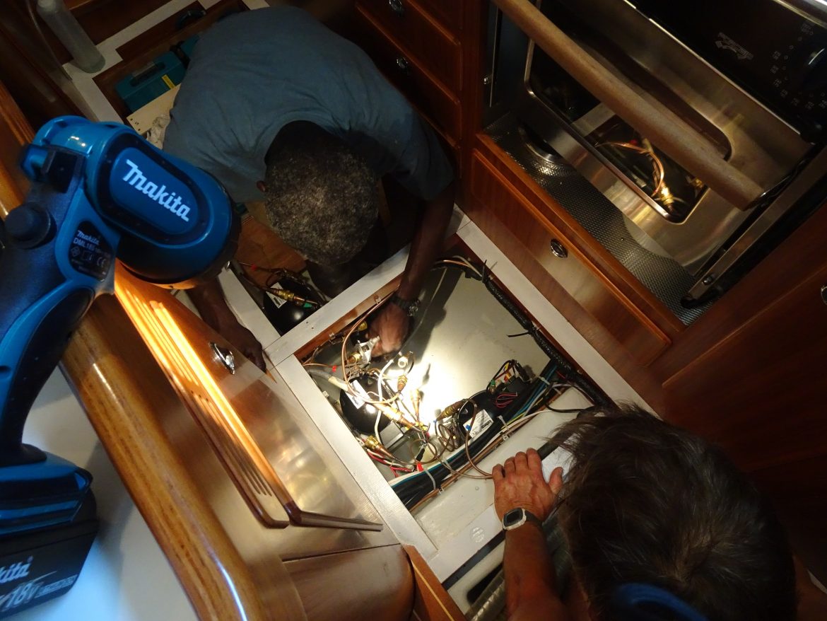 Selwin & Glen swapping the quick connects on the Isotherm fridge condensers Selwin & Glen swapping the quick connects on the Isotherm fridge condensers