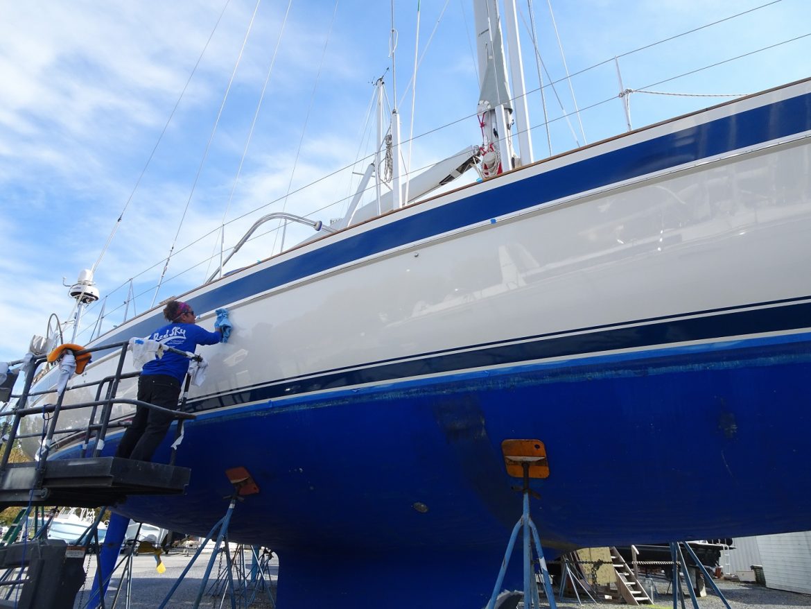 Karen applies second coat of Bravo on the hull Karen applies second coat of Bravo on the hull
