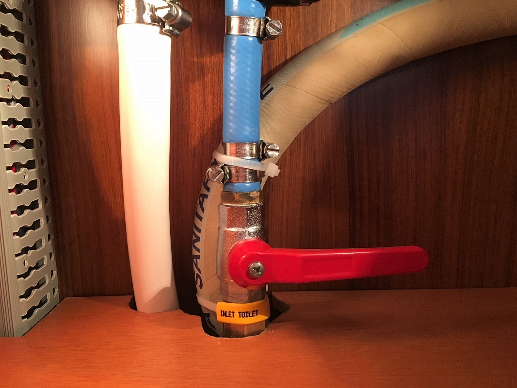 Aft toilet fresh water valve