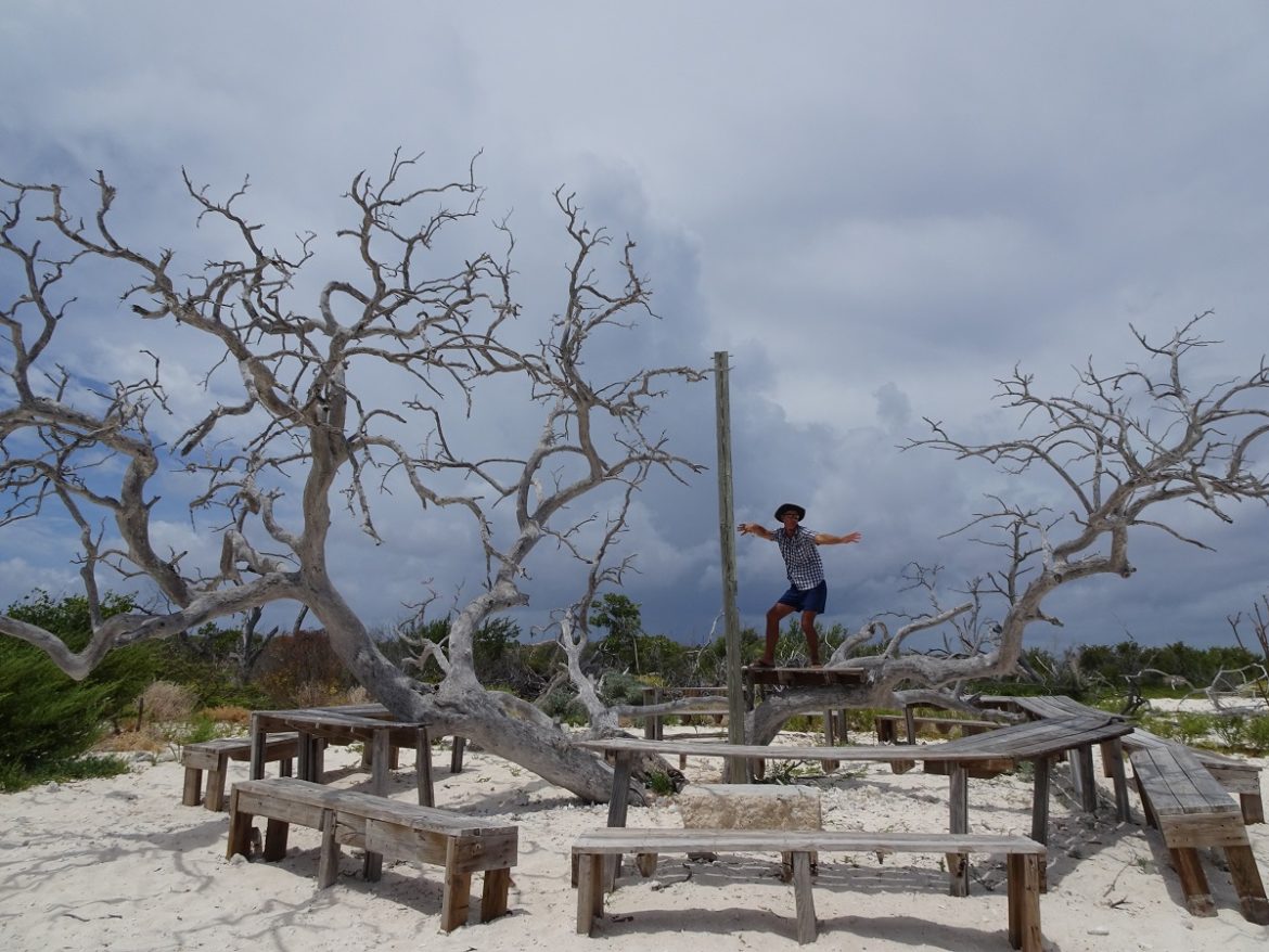 Glen plays the ceazy shaman on what looks like a voodoo rituals ground, north Grand Turk, Turks & Caicos Glen plays the crazy shaman on what looks like a voodoo rituals ground, north Grand Turk, Turks & Caicos