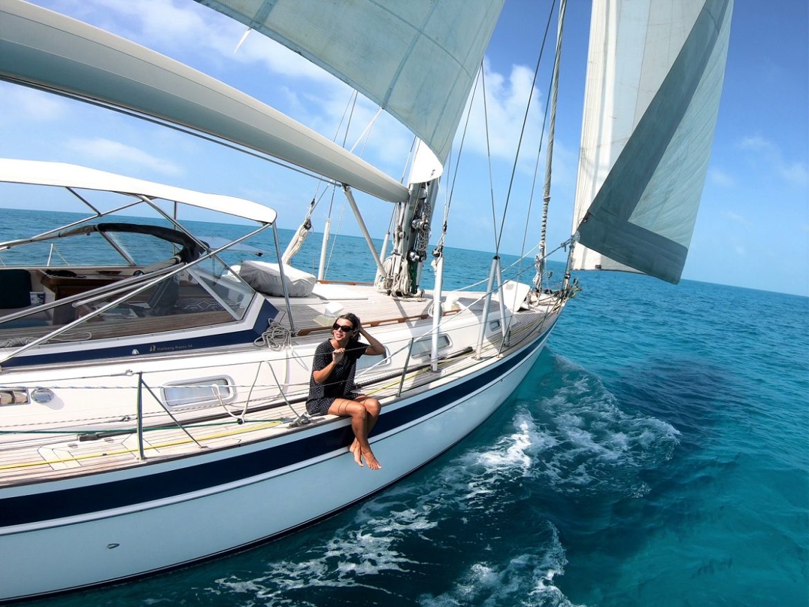 Happy crew on s/v Cloudy Bay sailing across Caicos Bank, Turks & Caicos Happy crew on s/v Cloudy Bay sailing across Caicos Bank, Turks & Caicos