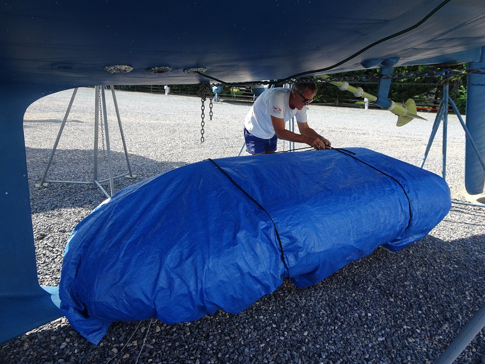 Dinghy stored under s/v Cloudy Bay
