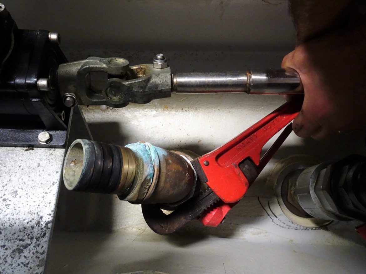 Removing some of the thru-hull fittings, s/v Cloudy Bay