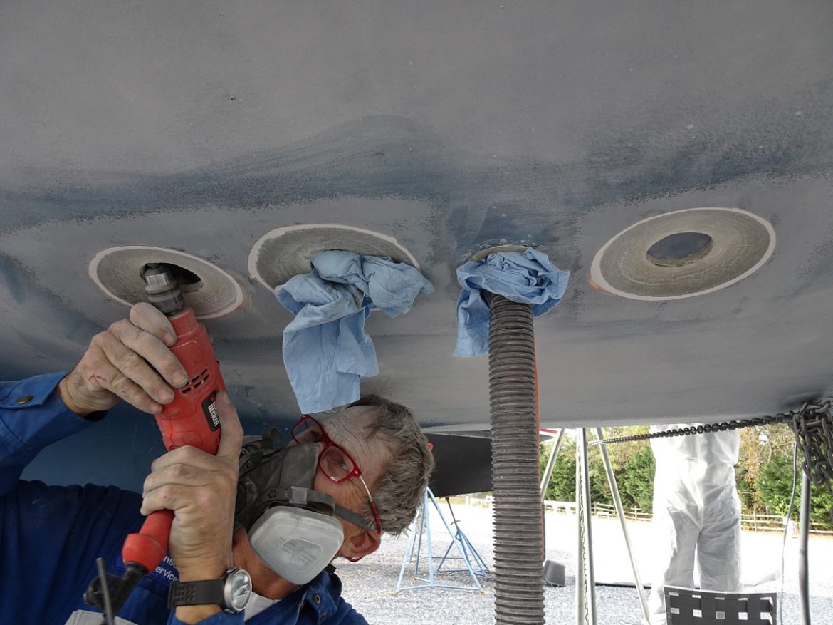 Beveling the holes for glassfibering -s/v Cloudy Bay Beveling the holes for glassfibering -s/v Cloudy Bay
