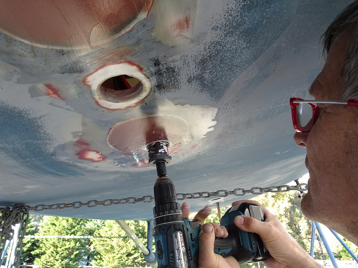 Drilling the new 1 1/2″ sink drain hole – s/v Cloudy Bay Drilling the new 1 1/2" sink drain hole - s/v Cloudy Bay