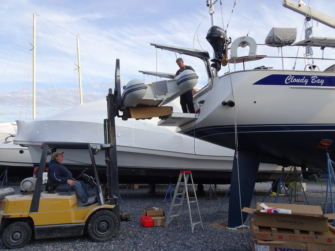 Ray helps with the forklift, and dinghy gets the”Welcome to Cloudy Bay” Ray helps with the forklift, and dinghy gets the"Welcome to Cloudy Bay"