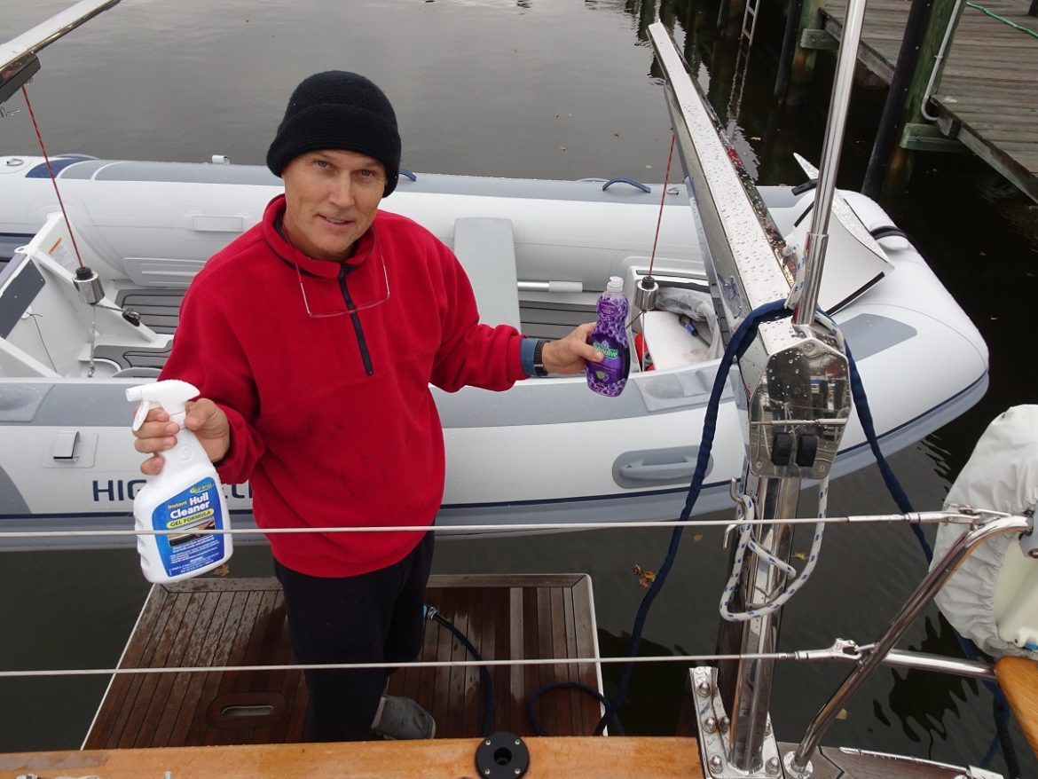 Cleaning the petrol leaked in the dinghy Cleaning the petrol leaked in the dinghy