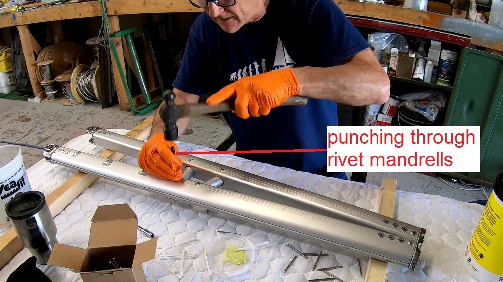 riveting and reassembling the spreaders riveting and reassembling the spreaders