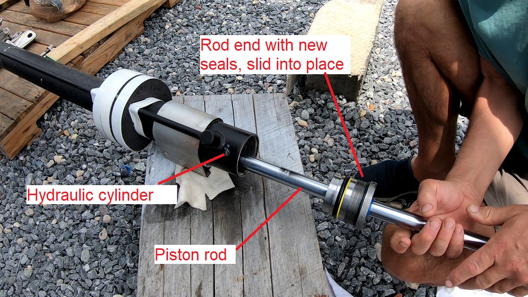 rod end with new seals slid into the hydraulic cylinder rod end with new seals slid into the hydraulic cylinder