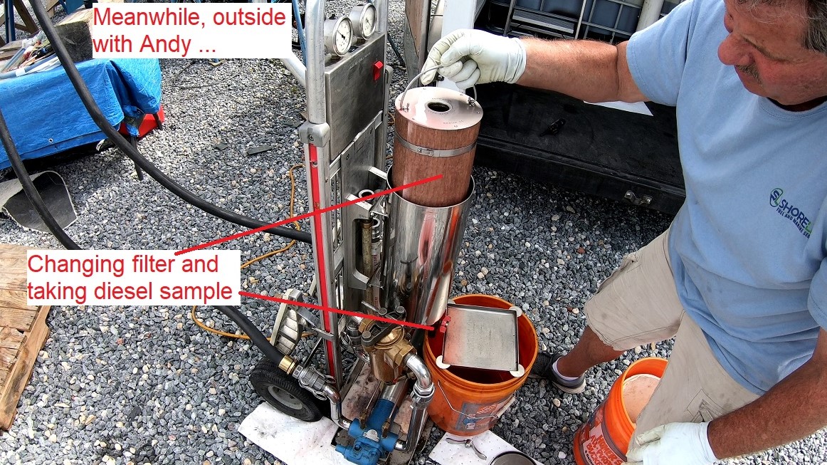 polish diesel tanks: Andy monitors outside, changing filters and taking diesel samples